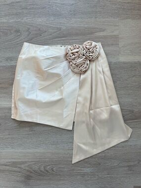 Satin Mini Skirt with Floral Rosette Detail in Cream